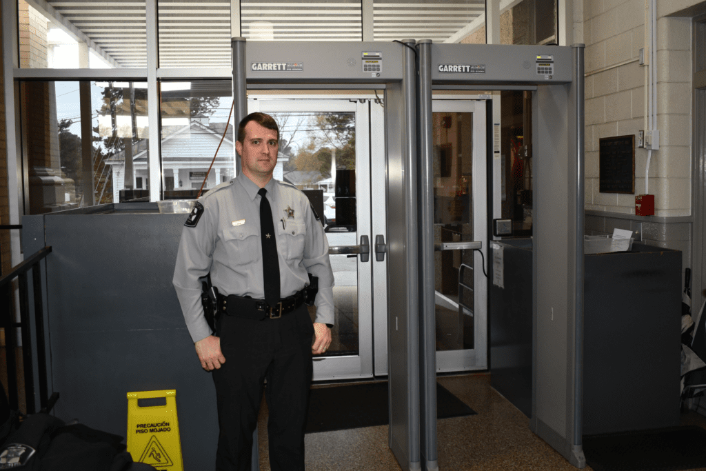 Photo of courthouse entrance security Baliff.